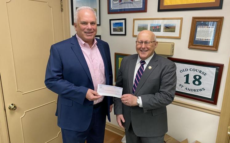 Mayor George C. Brown Accepts Contribution to City from Children’s Service Center